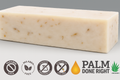 Bar of soap with palm oil certification logos on a gray background